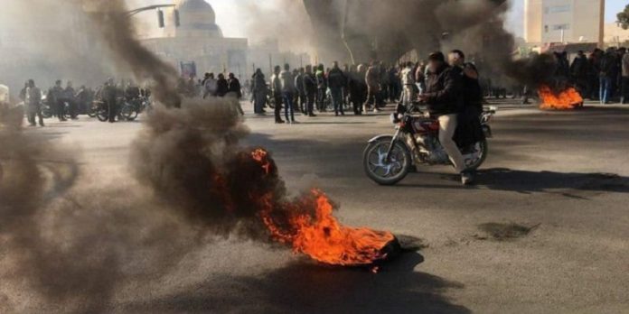 iran-uprising-2019-motorcycle-burned