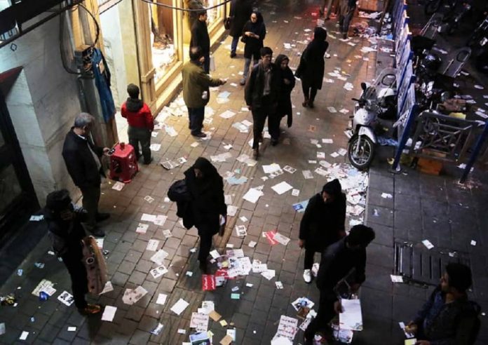 File-photo-people-ignore-the-campaign-posters-and-throw-them-on-the-ground