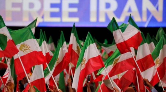 supporters_of_the_national_council_of_resistance_of_iran_ncri_attend_a_rally_in_villepinte_near_paris_france_june_30_2018._reuters