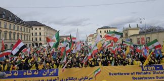 Rally masiv në Mynih më 13 shkurt 2026 jehon thirrjet e ngrihjes në Iran: “Jo Shah, Jo Mullahë”. Fjalimet e Maryam Rajavi, John Bercow dhe Struan Stevenson kërkojnë republikë demokratike, pa monarki apo teokraci. Mbështetje për popullin iranian kundër diktaturës.